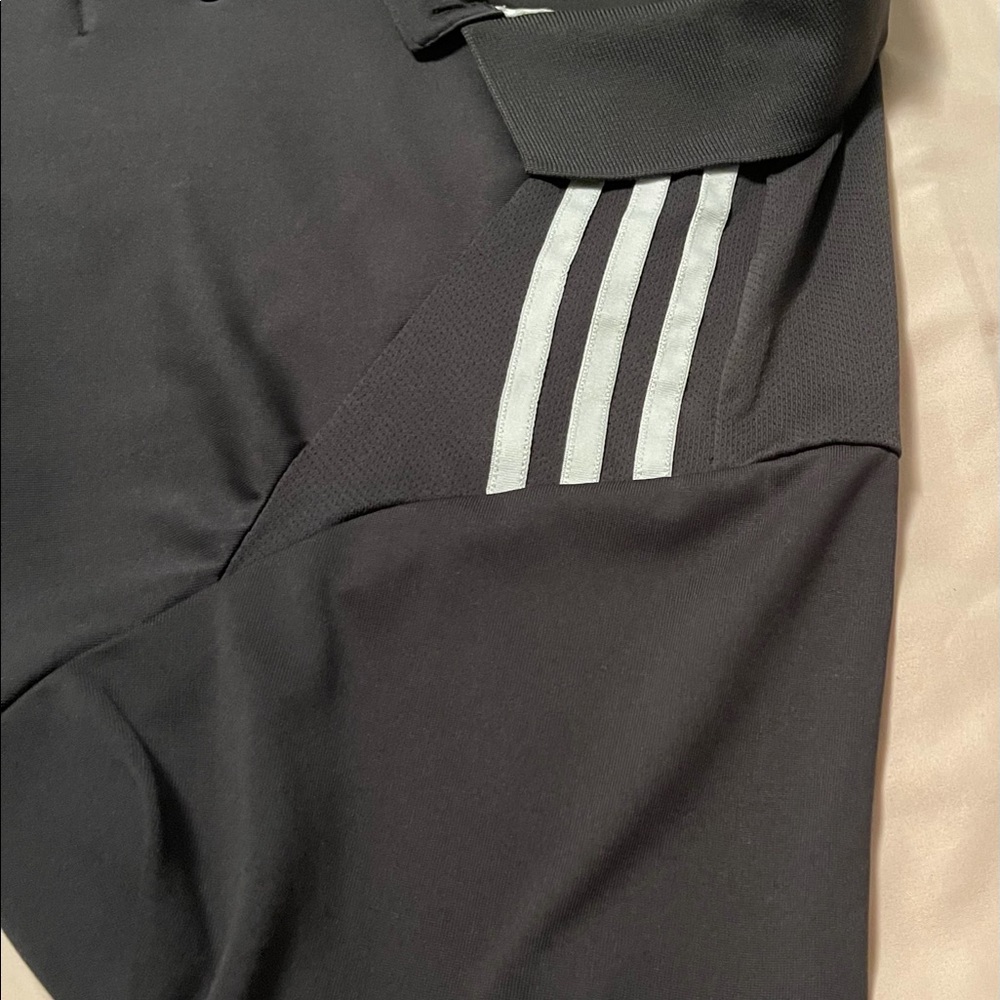 Men’s gently used Adidas golf polo size medium